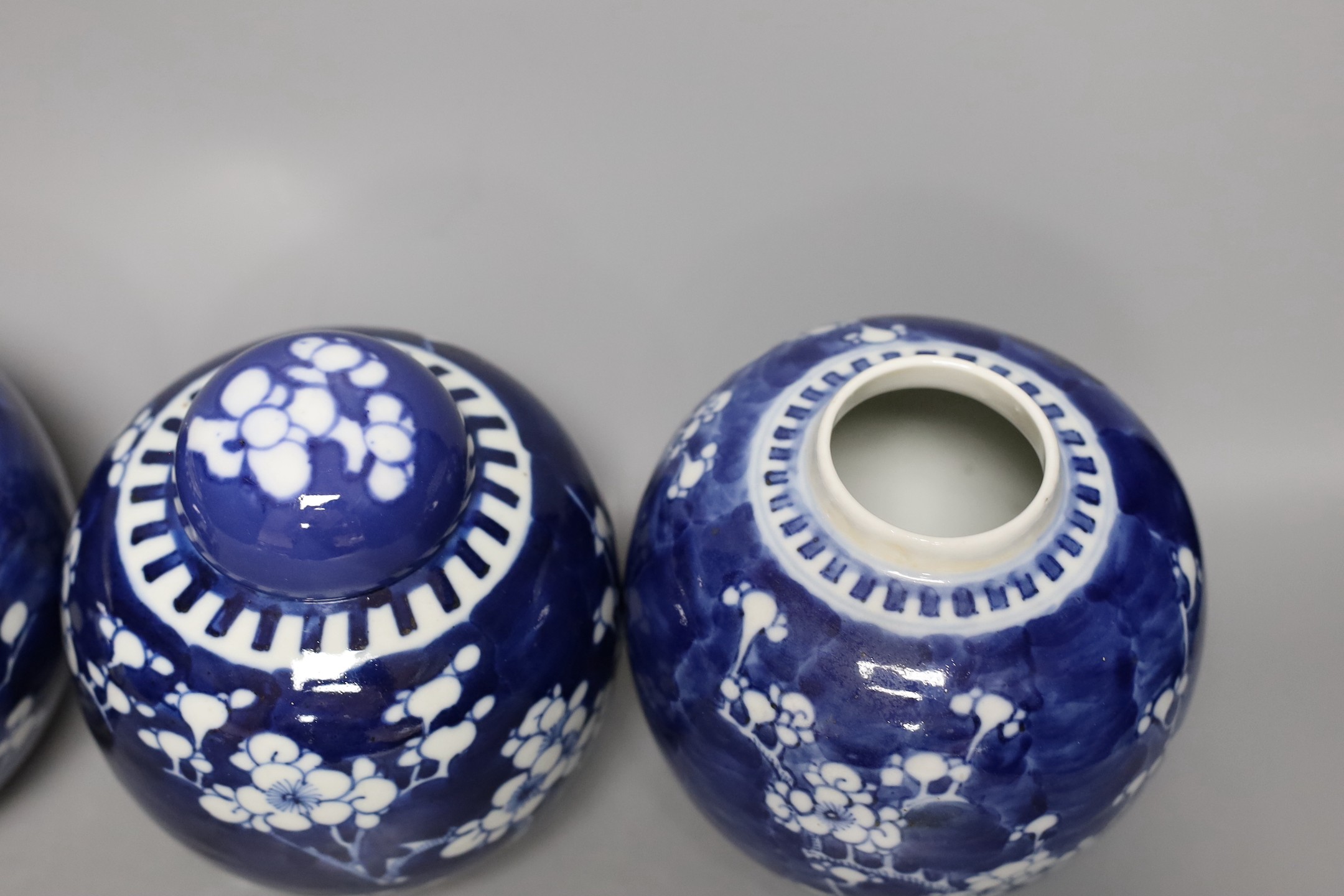 Four 19th / early 20th century Chinese blue and white prunus jars, 14cm